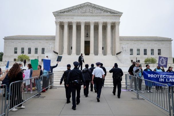 May 3, 2022: U.S. Supreme Court Police officers set up barricades on the sidewalk as pro-choice and anti-abortion activists demonstrate in front of the U.S. Supreme Court Building in Washington, DC. In a leaked initial draft majority opinion obtained by Politico, Supreme Court Justice Samuel Alito allegedly wrote that the cases Roe v. Wade and Planned Parenthood of Southeastern Pennsylvania v. Casey should be overturned, which would end federal protection of abortion rights across the country.