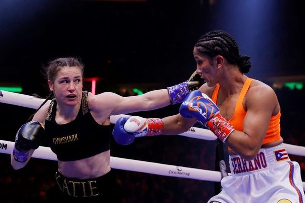 April 30, 2022: Katie Taylor of Ireland trades punches with Amanda Serrano of Puerto Rico (white trunks) for the World Lightweight Title fight at Madison Square Garden in New York, New York. The bout marked the first women’s boxing fight to headline Madison Square Garden in the venue’s history. Taylor defeated Serrano on a judges decision