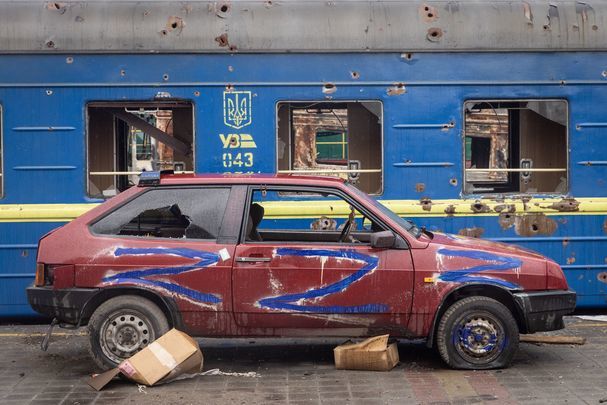 A car scrawled with the symbol \"Z\" at a former Russian base, the central train station in Trostyanets, in Ukraine.
