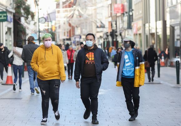 Members of the public wearing face masks on Grafton Street, during the Covid pandemic.