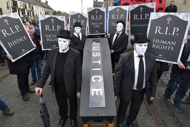 May 16, 2022:  Relatives for Justice stage a protest outside Hillsborough castle as Prime Minister Boris Johnson holds talks with leaders of Northern Ireland\'s main political parties in Hillsborough, Northern Ireland.