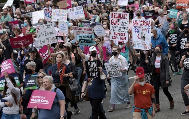 Roe v Wade: Abortion-rights demonstrators walk down Constitution Avenue during the Bans Off Our Bodies march on May 14, 2022 in Washington, DC.