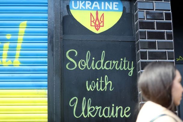 April 25, 2022: McGuinness\'s takeaway shop front with \"Solidarity with Ukraine\" artwork in Dublin.
