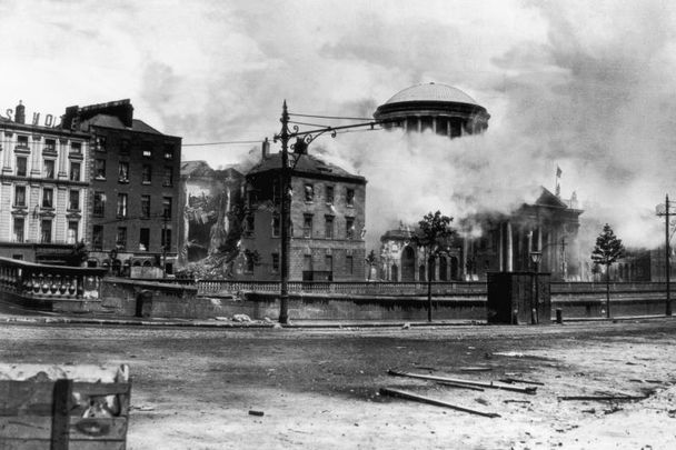 1922: The Four Courts, the Dublin headquarters of the anti-Treaty Republicans, is shelled by Free State forces during the Irish Civil War.