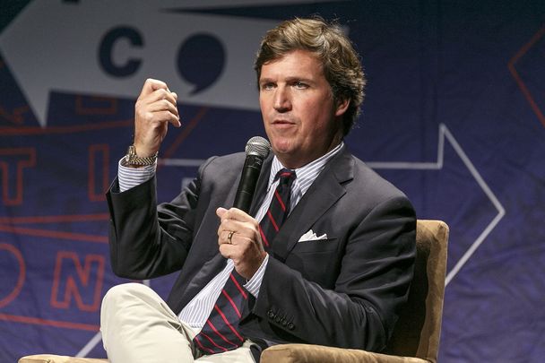 Tucker Carlson, a Fox News pundit and a proponent of the replacement theory.