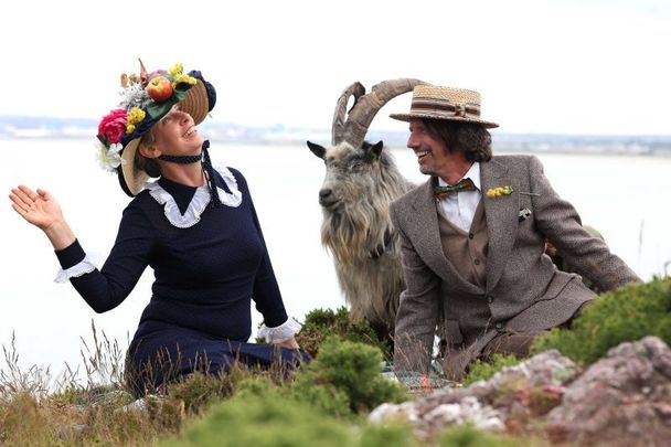 Clare Taylor, Ulli De Leener, and Diarmuid the goat re-enact a scene from James Joyce’s \"Ulysses\" on Howth Head, the site of a local biodiversity project helping to preserve the Old Irish Goat, a critically endangered native rare breed.
