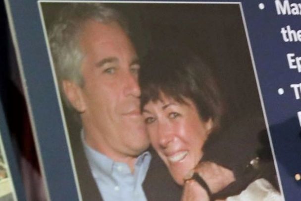 July 2, 2020: A photo of Jeffrey Epstein and Ghislaine Maxwell featured when Acting United States Attorney for the Southern District of New York Audrey Strauss spoke to the media at a press conference announcing the arrest of Maxwell. 