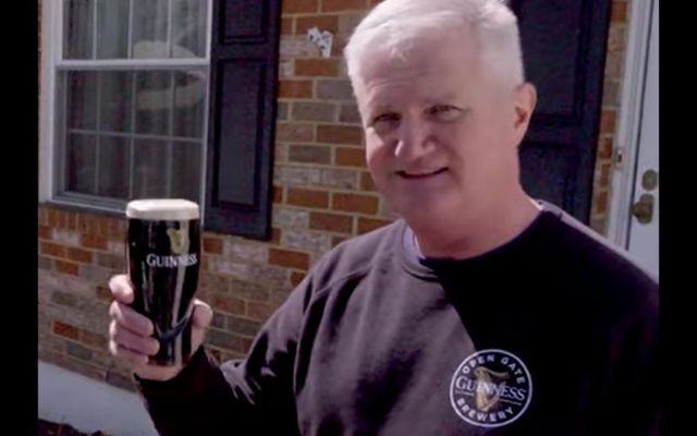 Irish American Tom Ponton raises a pint after winning $50,000 from Guinness for his original St. Patrick\'s Day toast.