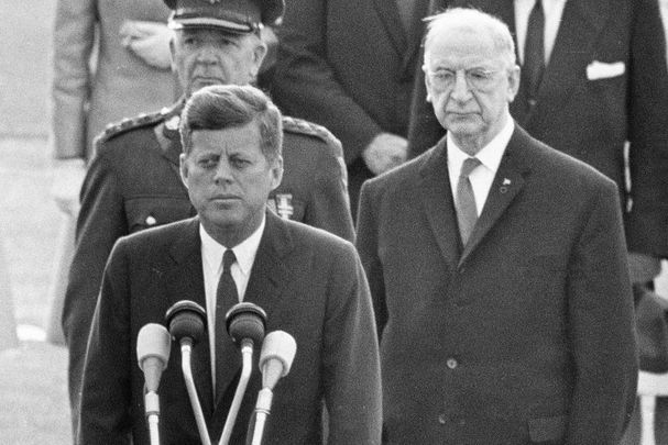 June 1963: US President John F Kennedy giving a speech during his visit to Ireland. President of Ireland Eamon de Valera stands behind him.