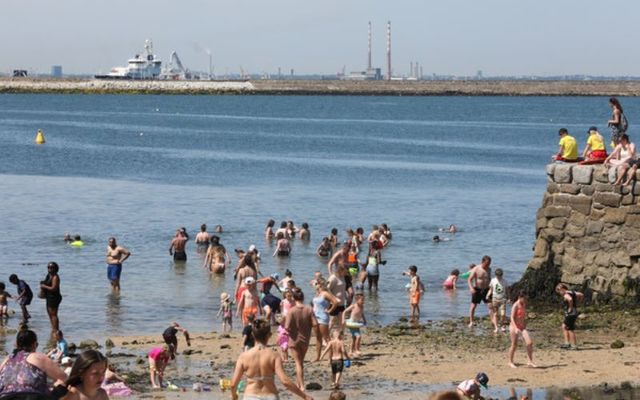 Members of the public enjoy a heatwave in Dublin in July 2021. 