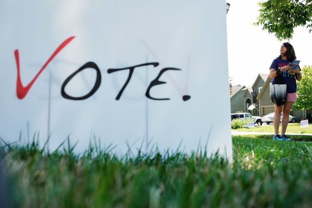 August 1, 2022:  Kelly Brende for the Vote No on the Constitutional Amendment on Abortion canvases a neighborhood in Lenexa, Kansas. On August 2, voters voted not to remove protection for abortion from the state constitution.