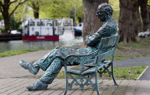 A statue of Patrick Kavanagh on the banks of the Grand Canal, in Dublin. 