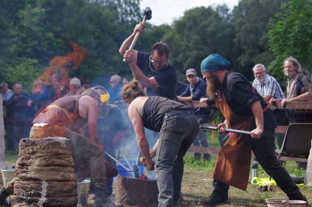 Iron smelters engaging in bloom compacting.