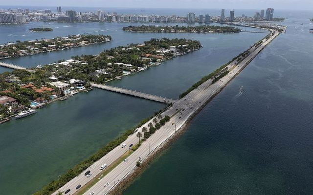 An aerial view of the waters of Biscayne Bay surrounding Palm Islands, which is crowded with residential homes on July 21, 2022, in Miami, Florida. The City of Miami and Miami Beach are expected to be profoundly impacted by rising sea levels due to climate change.