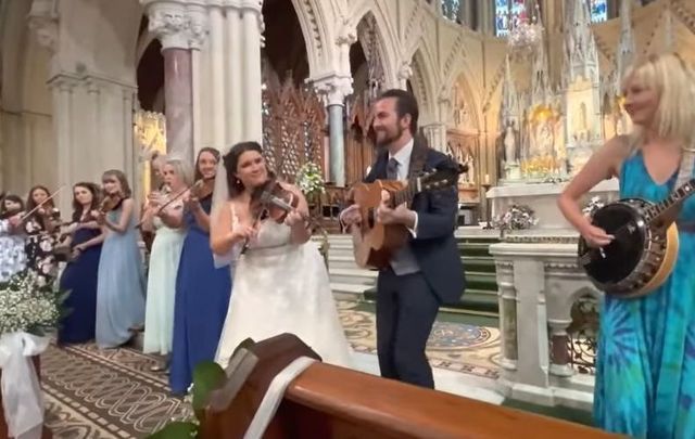 Hup! Abbey Ní Loinsigh and Stephen O\'Dea brought the craic to St. Coleman\'s Cathedral in Cobh, Co Cork for their wedding.