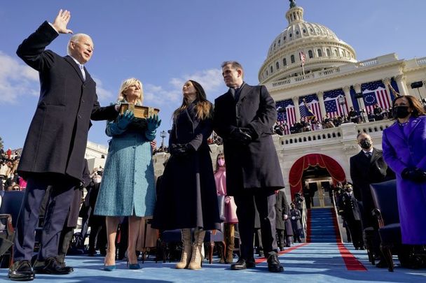 January 20, 2021: Joe Biden is sworn in as the 46th president of the United States by Chief Justice John Roberts, as Jill Biden, Ashley Biden, and Hunter Biden look on the West Front of the US Capitol on in Washington, DC. 