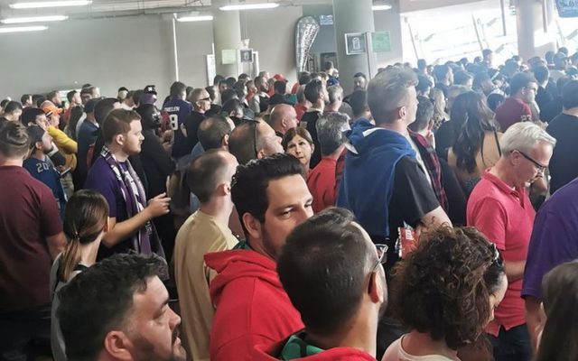 Crowds queue up for free pint\'s at Dublin\'s Aviva Stadium. 