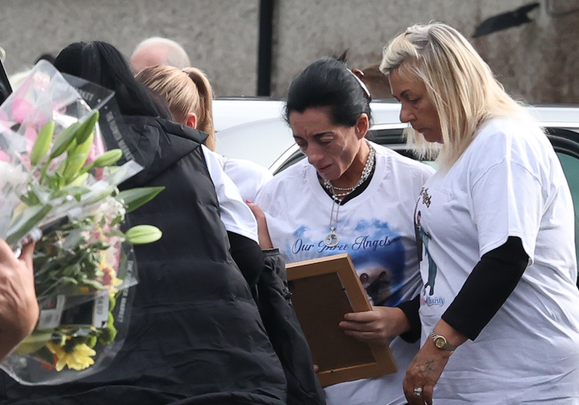 Margaret Cash McDonagh arriving outside the church today for the funeral of her children Lisa Cash, Chelsea and Christy Cawley, which takes place in St Aidan’s Church, Brookfield, Dublin. 