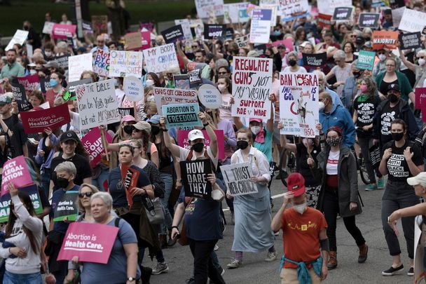 May 14, 2022: : Abortion-rights demonstrators walk down Constitution Avenue during the Bans Off Our Bodies march in Washington, DC.