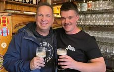 WATCH: Garth Brooks surprises locals in Dingle pub, pulls his own pint of Guinness 