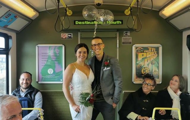 Patrick and Megan riding the DART to their wedding in Dublin.
