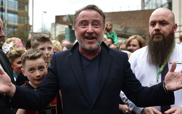 April 10, 2022: Michael Flatley, star of Riverdance and Lord of the Dance, is mobbed by fans as he makes an appearance during the opening day of the World Irish Dancing Championships at the Waterfront Hall in Belfast, Northern Ireland.