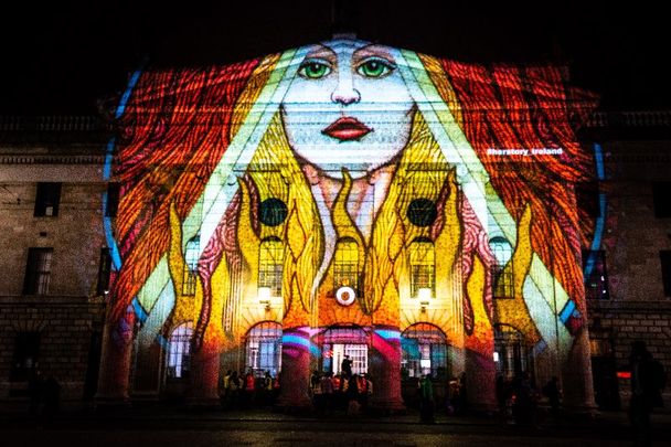 Brigid’s Fire by artist Courtney Davis blazing on the GPO in Dublin for the 2020 International Herstory Light Festival.