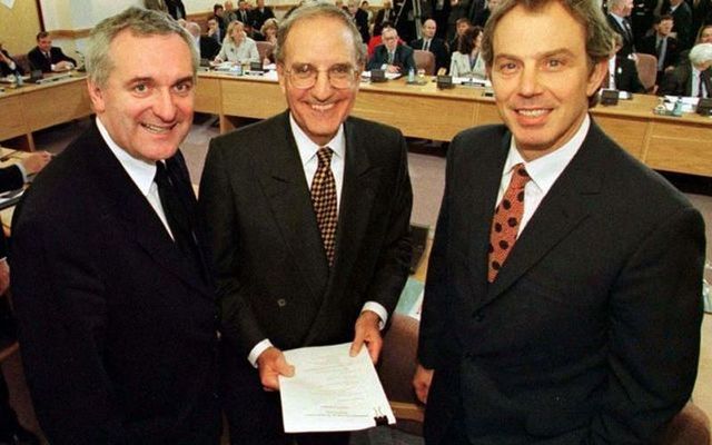 April 10, 1998: Taoiseach Bertie Ahern, US Senator George Mitchell, and British Prime Minister Tony Blair at Castle Buildings Belfast, after they signed the peace agreement that will allow the people of Northern Ireland to decide their future. 