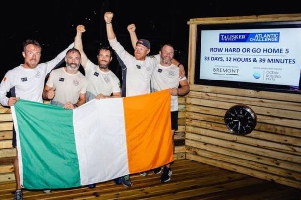 \"Row Hard or Go Home 5\" - Tom Nolan, Shane Culleton, Derek McMullen, and brothers Gearoid and Diarmuid Ó Briain - celebrate after completing the Talisker Whisky Atlantic Rowing Challenge in record time on January 15.