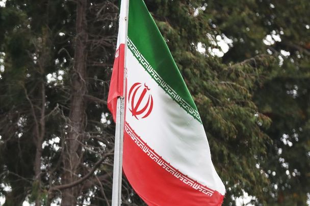 October 12, 2022: The flag of Iran flying over the entrance to the Embassy of the Islamic Republic of Iran in Dublin.