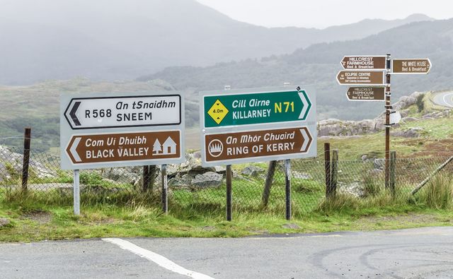 Moll\'s Gap, County Kerry: Ireland\'s road signs are written in both Irish and English.