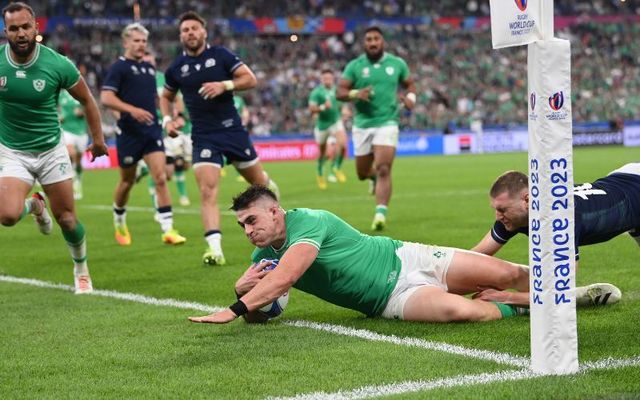 Dan Sheehan of Ireland scores his team\'s fifth try whilst under pressure from Finn Russell of Scotland during the Rugby World Cup France 2023 match between Ireland and Scotland at Stade de France on October 07, 2023 in Paris, France.