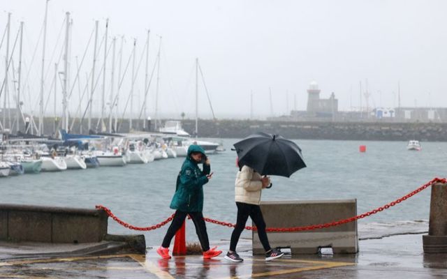 September 27, 2023: People on Howth Pier in Dublin during Storm Agnes. 