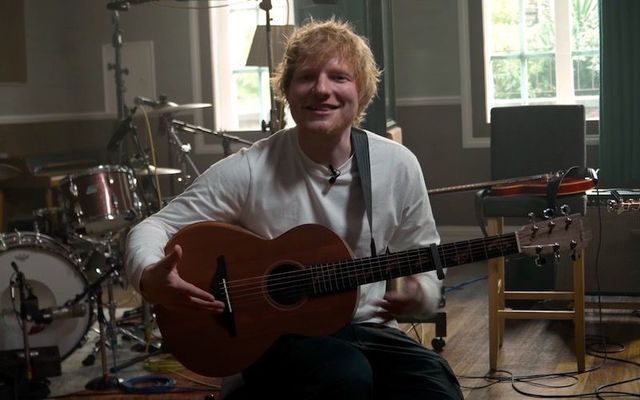 Ed Sheeran with the Sheeran by Lowden Autumn Variations Limited Edition acoustic guitar.