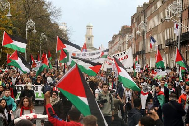 A huge crowd of people and protesters on Merrion Square as part of the National Demonstration for Palestine in Dublin.