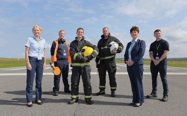 Donegal Airport staff: Trisha Gillespie, Pádraig Ó Cearbhaill, Gavin Dunleavy, Dennis Forker, Cathal Mac Giolla Easbuic, Máire Ní Dhónaill.