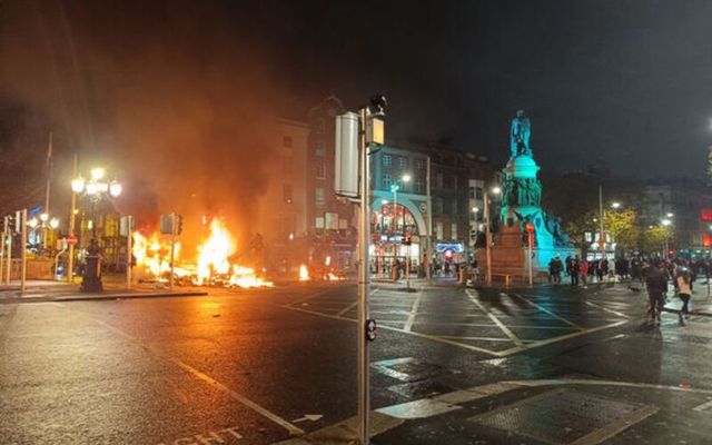  A bus burns just off O\'Connell Street Bridge in Dublin