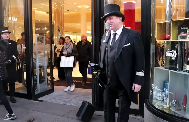 Sean Boland, serenading the crowds of busy Christmas shoppers on Grafton Street in Dublin.