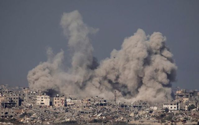 December 8, 2023: An explosion is seen over Gaza, viewed from Israel in the Southern border of Israel.