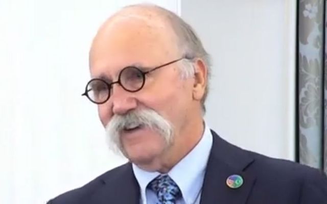 Jerry Case accepting the 2023 Associates of the American Foreign Service Worldwide (AAFSW) Secretary of State Award for Outstanding Volunteerism Abroad.