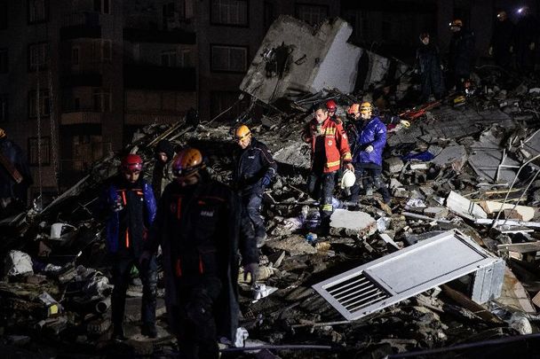 February 6, 2023: Rescue workers attend the scene of a collapsed building in Iskenderun Turkey. A 7.8-magnitude earthquake hit near Gaziantep, Turkey, in the early hours of Monday, followed by another 7.5-magnitude tremor just after midday. The quakes caused widespread destruction in southern Turkey and northern Syria and were felt in nearby countries.