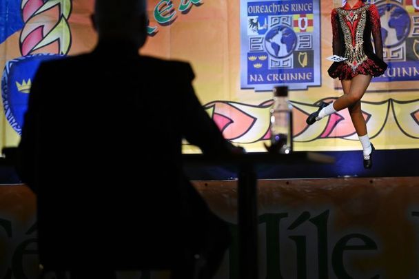 Aprill 10, 2022: A judge watches a competitor during the opening day of CLRG\'s World Irish Dancing Championships at the Waterfront Hall in Belfast, Northern Ireland. 