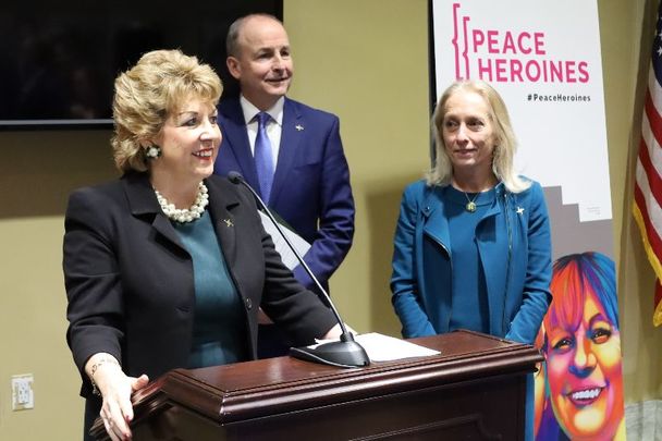 Irish Ambassador to the United States Geraldine Nason Byrne speaks at the launch of Peace Heroines at the US Congress, Washington DC. Also pictured are Tánaiste and Minister for Foreign Affairs and Defence Micheál Martin and US Congresswoman Mary Gay Scanlon.