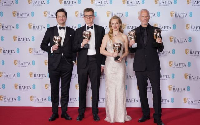 Producer Peter Czernin, Producer Graham Broadbent, Kerry Condon and Writer and director Martin McDonagh pose with the Outstanding British Film Award for \'The Banshees of Inisherin\' at Sunday night\'s BAFTAs. 