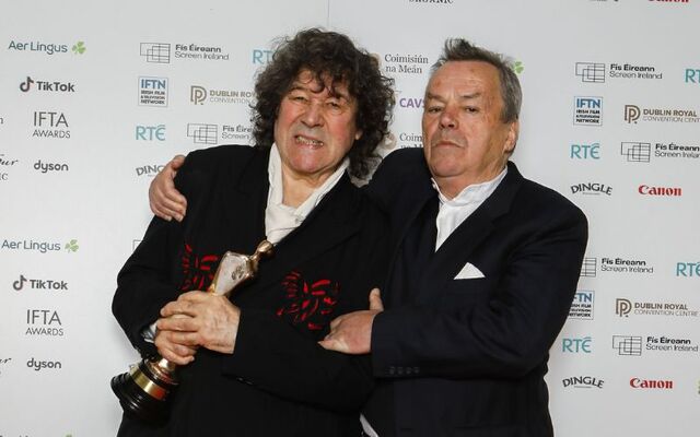 Actor Stephen Rea and Irish director Neil Jordan fooling around at the 2024 IFTAs.