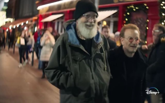 David Letterman and Bono walk through Dublin City. 