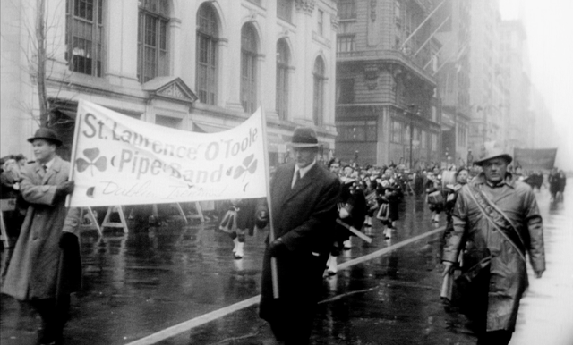 New York City\'s St. Patrick\'s Day Parade: The St. Lawrence O\'Toole Pipes and Band marching up Fifth Avenue on March 17, 1960.