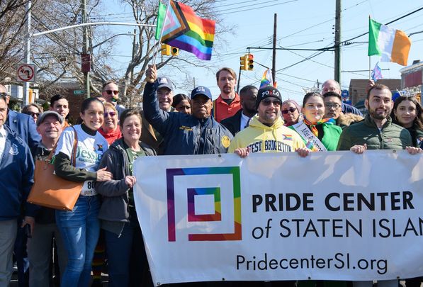 The Pride Center, with Mayor Eric Adams (center), during its rainbow run on Sunday.