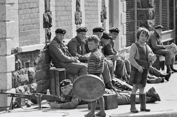 British soldiers photographed with local children during The Troubles in Northern Ireland.