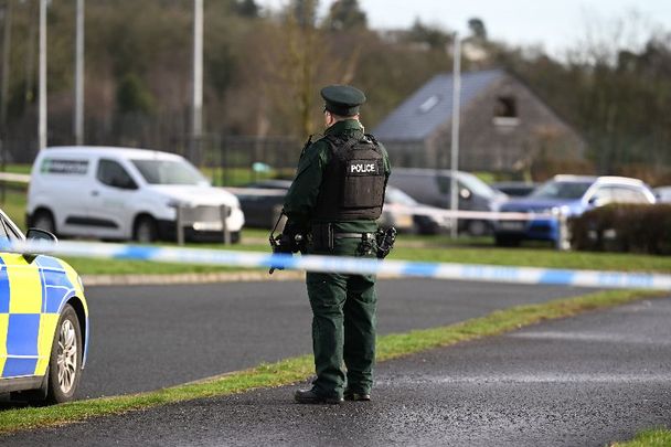 February 23, 2023: Police and forensics at the scene the day after the shooting of Detective Chief Inspector John Caldwell at the Youth Sports Centre in Omagh, Northern Ireland. 